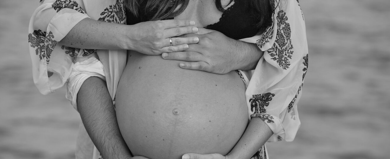 a woman holding a baby